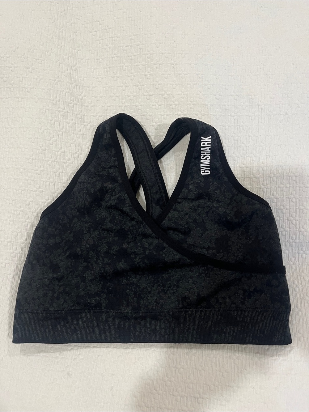 Gymshark Black Cross-Back Sports Bra with Subtle Pattern